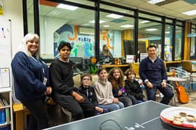 Alan Mak MP at WAVE's hub on Hayling with manager Sarah Foley and young people from the Island