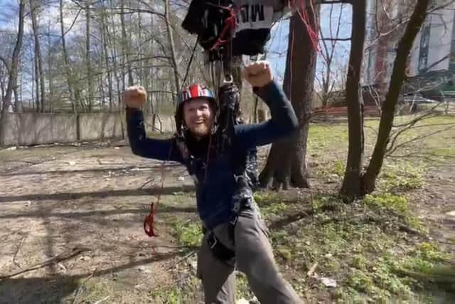 John pictured after landing from his base-jump in Ukraine