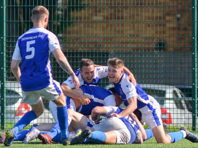 Denmead celebrate one of their four goals. Picture by Martyn White