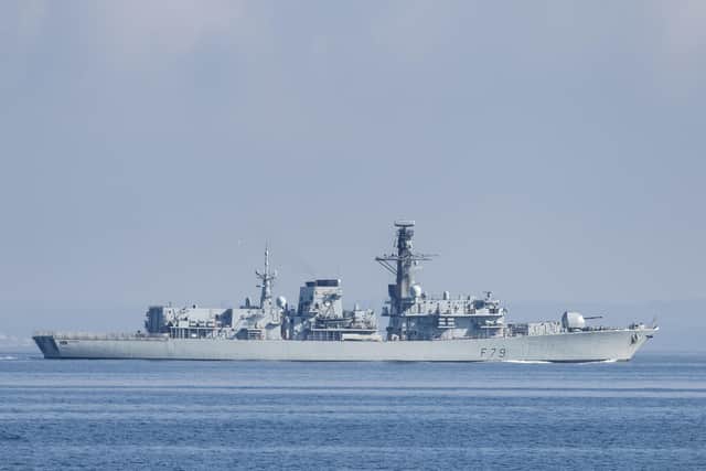Pictured: HMS Portland passes by HMS Argyll.