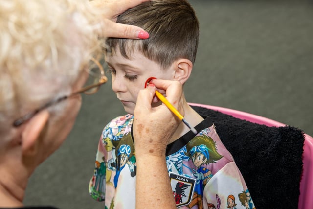 Teddy, 7, from Portsmouth, getting his face painted.  Photos by Alex Shute