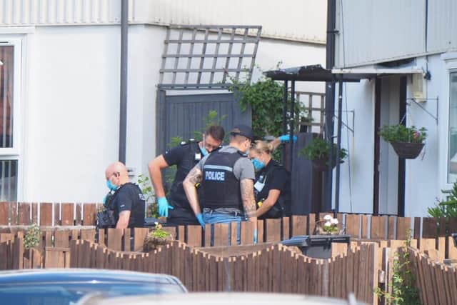 Police outside in Winchcombe Road in Paulsgrove this morning. Picture: Habibur Rahman