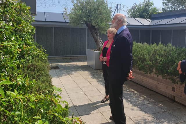 Prince Michael admires the Wall of Remembrance at the naval museum in Gosport. Photo: NMRN