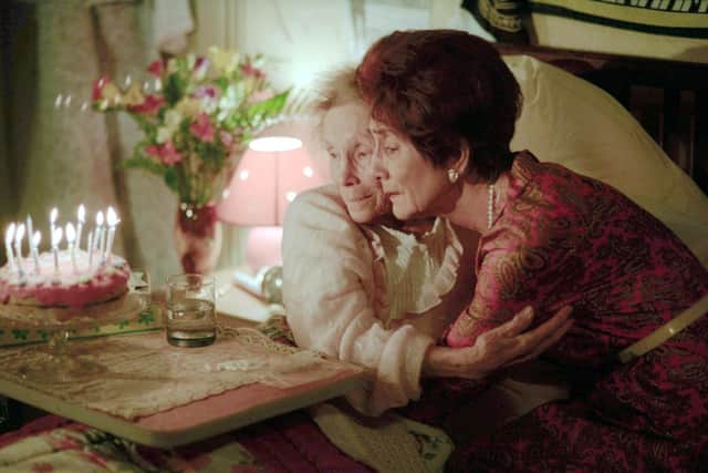 BBC undated handout photo of June Brown passed away at her home in Surrey on Sunday. Pictured is June Brown and John Bardon in their roles as Gretchen Franklin (left) as Ethel and June Brown as Dot Cotton during an episode of EastEnders. Picture: BBC/PA Wire.