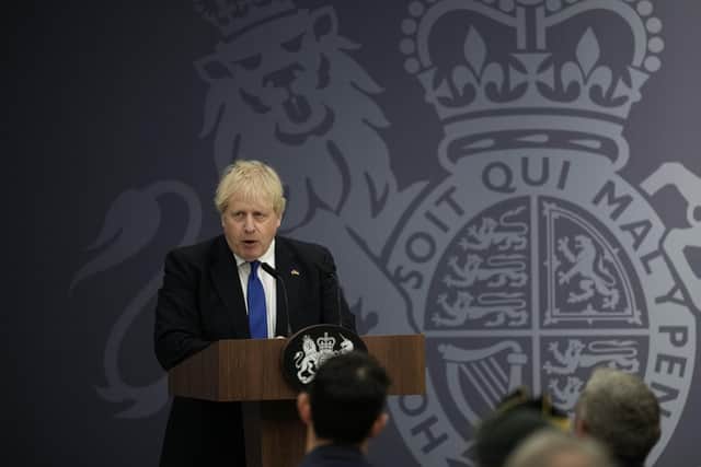 British Prime Minister Boris Johnson delivers a speech to members of the armed services and Maritime and Coastguard Agency at Lydd airport in Kent. Picture date: Thursday April 14, 2022.
