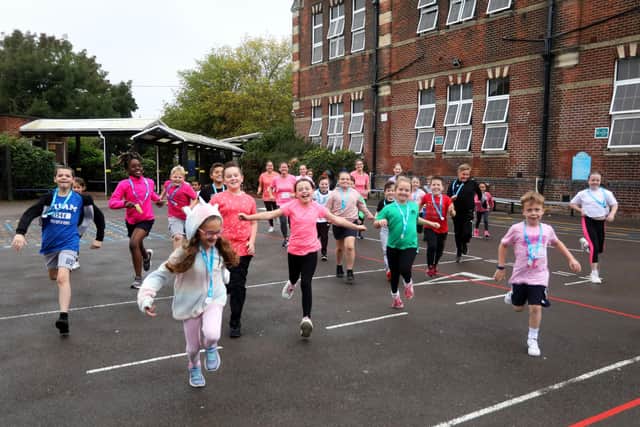Kids from Newbridge and Penhale Infants School in Portsmouth pictured taking part in a mini Race for Life.Picture: Sam Stephenson