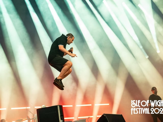 Prodigy and The Streets shone on the Main Stage, while Johnny Marr and The Pretenders rocked the Big Top. The Isle of Wight Festival Day 2 saw festival goers revelling in the sun.