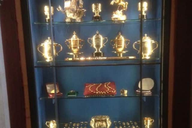Display cabinet at Arundel Castle in West Sussex from which a set of 'irreplaceable' gold rosary beads carried by Mary Queen of Scots to her execution in 1587 were taken, along with other historic treasures worth more than £1m. 
Arundel Castle/PA Wire