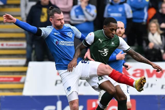 Ryan Tunnicliffe, pictured battling for possession in Saturday's 3-1 defeat at Plymouth, has earned praise from John Mousinho. Picture: Graham Hunt/ProSportsImages