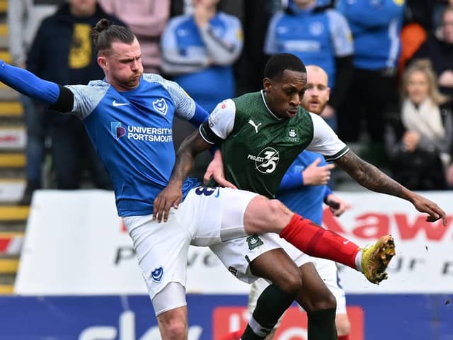 Ryan Tunnicliffe, pictured battling for possession in Saturday's 3-1 defeat at Plymouth, has earned praise from John Mousinho. Picture: Graham Hunt/ProSportsImages