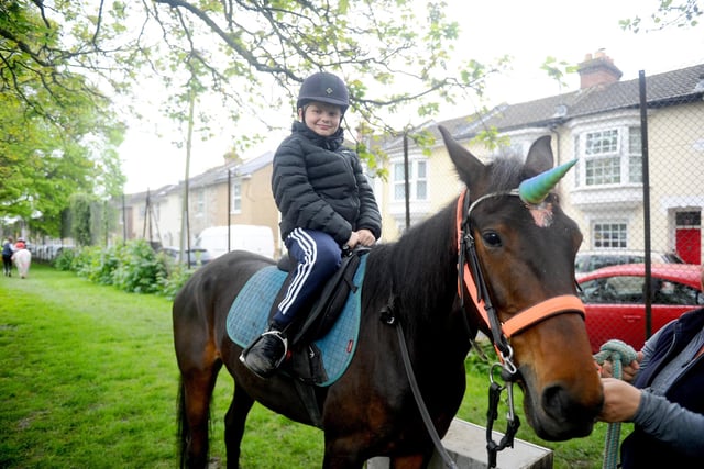 St Mary's Church in Fratton, May Fayre took place on bank holiday Monday, May 6, 2024.

Pictured is: Archie Ferguson (11) from Portsmouth, has a pony ride on Thor.

Picture: Sarah Standing (060524-8509)