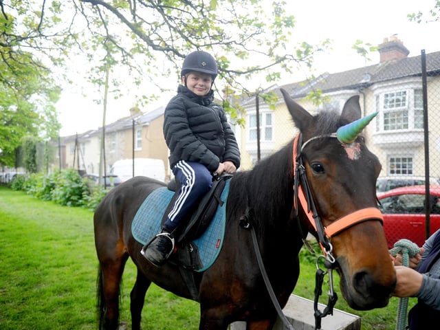 St Mary's Church in Fratton, May Fayre took place on bank holiday Monday, May 6, 2024.Pictured is: Archie Ferguson (11) from Portsmouth, has a pony ride on Thor.Picture: Sarah Standing (060524-8509)