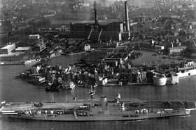 HMS Victorious leaves Portsmouth Harbour some time after 1950