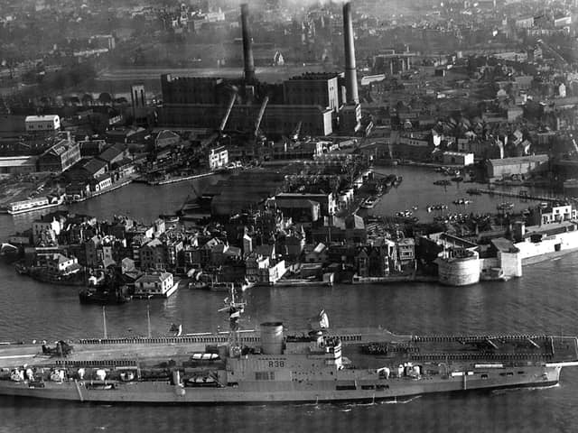 HMS Victorious leaves Portsmouth Harbour some time after 1950