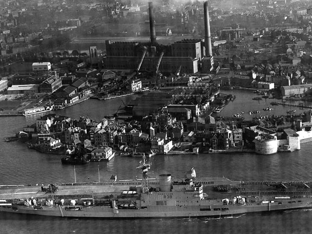 HMS Victorious leaves Portsmouth Harbour some time after 1950