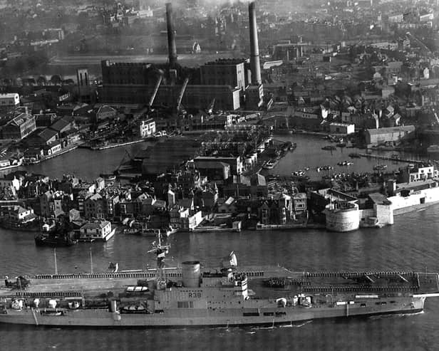 HMS Victorious leaves Portsmouth Harbour some time after 1950