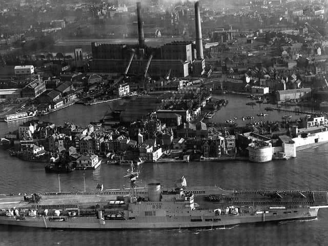 HMS Victorious leaves Portsmouth Harbour some time after 1950