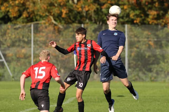 Horndean Hawks (red/black) v Horndean United in Division 6 action. Picture: Kevin Shipp.