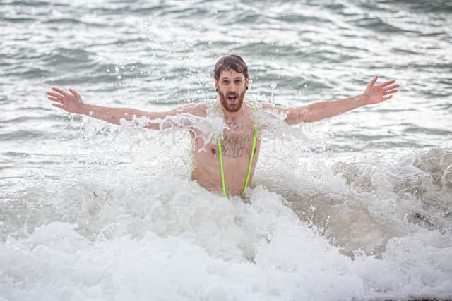 Ben celebrates by taking a dip into the sea near South Parade Pier, Southsea.

Picture: Habibur Rahman