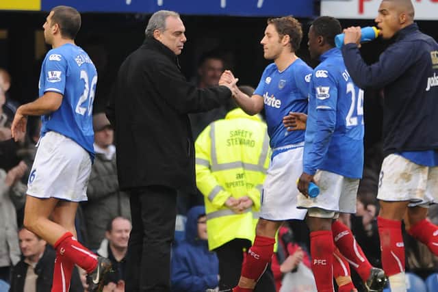 Pompey boss Avram Grant congratulates Michael Brown following a 2-0 win over Burnley in December 2009. Picture: PA