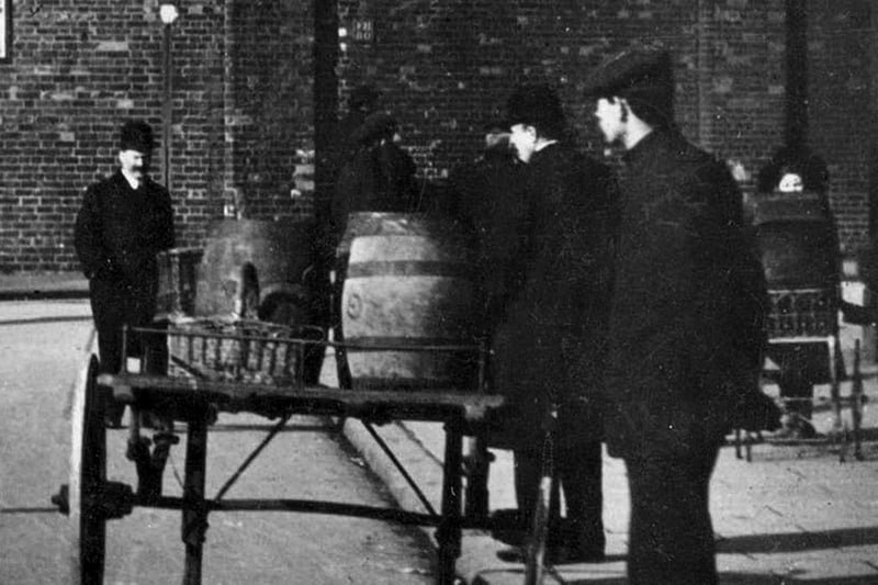 Barrels of beer sit on a cart ready for delivery to the pubs at Old Portsmouth around 1910. Picture: costen.co.uk
