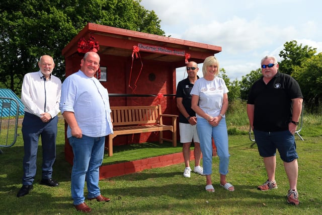 Fleetlands club officials (from left) Mark Hook, Iain Sellstrom (chairman), Kevin Wrapson, Jackie Wrapson and Andy Burdon at a new bench honouring the memory of former club president George Mason.
Picture: Chris Moorhouse