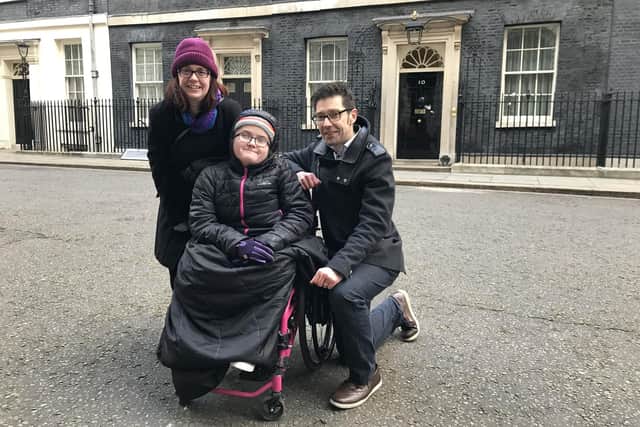 Aimee White, Emily White and Dan White outside 10 Downing Street in 2018, when they handed in a huge petition calling for better support for disabled people and their families. Picture: Byron Melton
