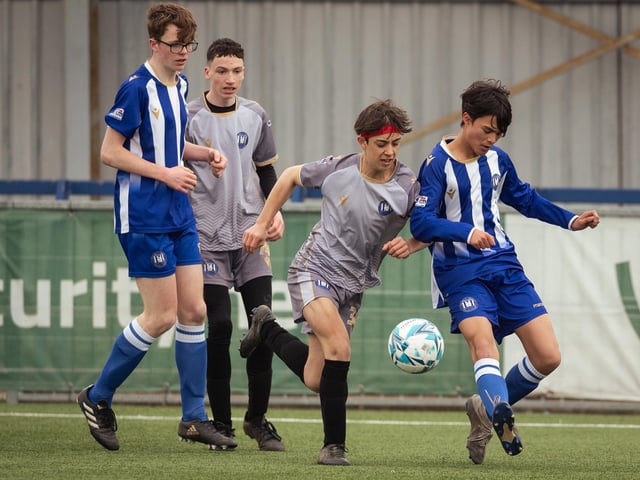 Action from the U15 Campbell McFaull Invitation Cup final between Hayling St Andrews Blue and Hayling St Andrew White. Picture: Keith Woodland (260221-291)