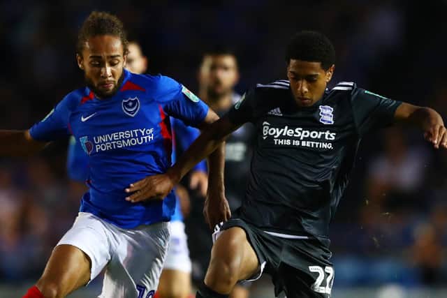 Pompey's Marcus Harness of Portsmouth battles for the ball with Jude Bellingham on his Birmingham debut at Fratton Park. Picture: Dan Istitene/Getty Images