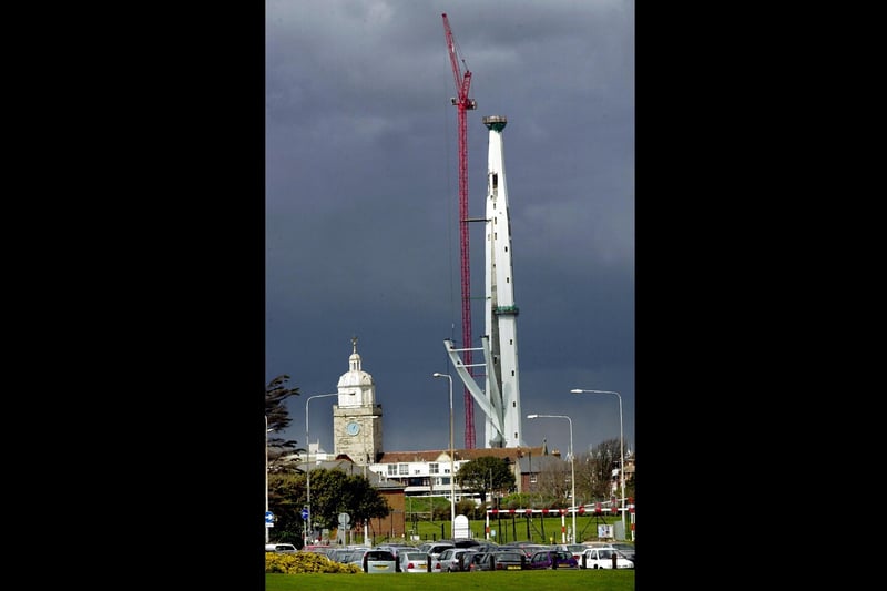 The Spinnaker Tower at Gunwharf Quays, Portsea, Portsmouth, seemingly dwarfed by the high tower crane used to construct the sails 19th April 2004. Picture: Michael Scaddan. 042003-0014