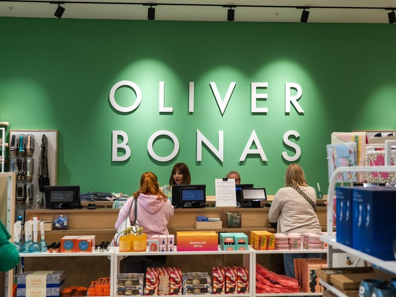 Photo of the cashier at the new Oliver Bonas store at Gunwharf Quays, Portsmouth. Pictured is Rose Swatton serving a customer.