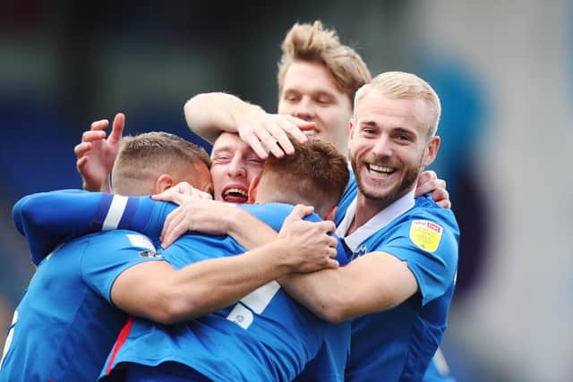 Jack Whatmough and Sean Raggett, both pictured, have been mainstays of Pompey's defence this season. Picture: Joe Pepler