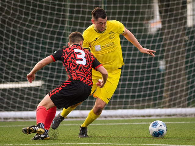 Action from Harvest's 4-1 win at home to Locks Heath (red and black kit) in the Hampshire Premier League. Picture: Keith Woodland (180321-1245)