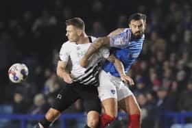 Marlon Pack battles for possession with Derby striker James Collins. Picture: Jason Brown/ProSportsImages