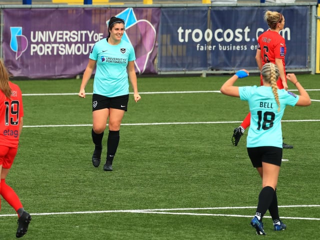 Pompey's Dani Lane has just scored. Picture by Dave Haines