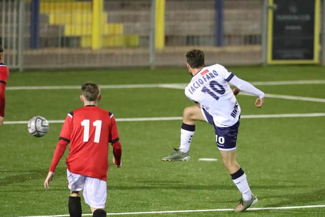 Joe Iaciofano fires the ball into the empty net to give Hawks the lead. Pic: Dave Haines.