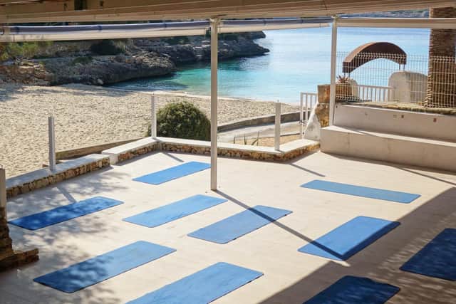 The private yoga decks overlooking the beach. Picture: Sardinia Yoga