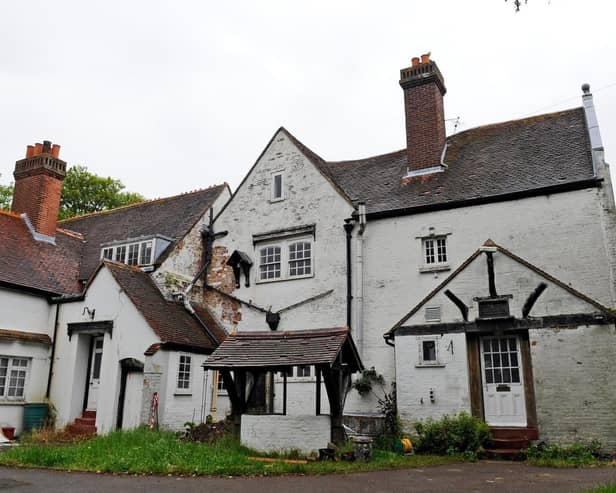The Manor house with medieval fabric and later work - said to be one of Hampshire's most haunted buildings, was acquired by a Trust in 2013. A condition survey and an investigation into options for future sustainable uses have been completed with grant aid from Historic England and the Architectural Heritage Fund. The house is in need of some structural repair, general renovation and a new use. It currently hosts events including ghost hunts.