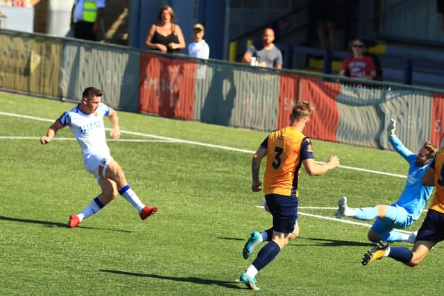 James Roberts fires Hawks 2-0 up against Slough. Picture by Dave Haines.