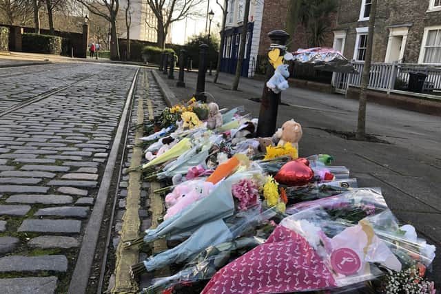 Flowers, soft toys and heartfelt messages left in tribute to a newborn baby girl who was found dead in at the junction of Old Commercial Road and Victoria Street in Buckland Picture: Millie Salkeld