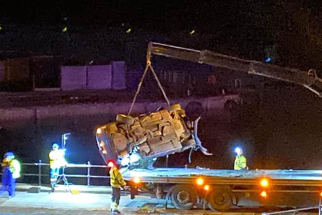 A car being pulled from Fareham Creek in the early hours of January 27, 2022