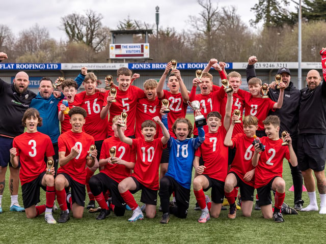 Horndean Youth Red celebrate winning the Under-14 Memorial Challenge Cup. Picture: Mike Cooter