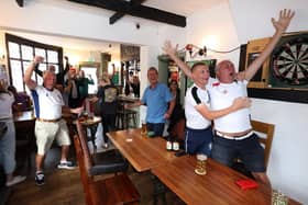 Fans celebrate as England turn the game on its head late on against Slovakia.Picture: Sam Stephenson.