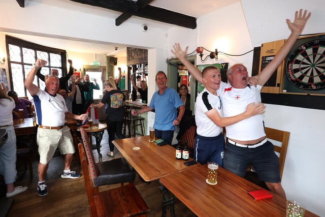 Fans celebrate as England turn the game on its head late on against Slovakia.Picture: Sam Stephenson.