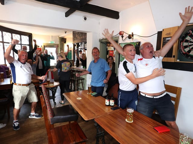 Fans celebrate as England turn the game on its head late on against Slovakia.Picture: Sam Stephenson.
