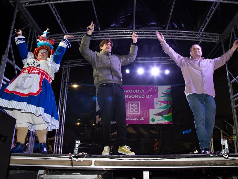 Hundreds of residents descended on Commercial Road to watch local dance troops and celebrities come together to turn on the Christmas lights.
Pictured - James Argent and Shaun Williamson sang YMCA to the crowds
Photos by Alex Shute