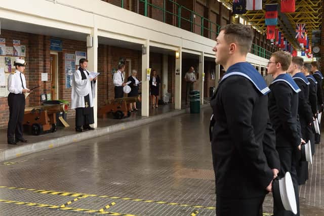 Today’s trainees pay their respects.