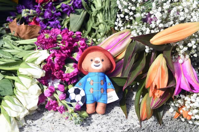 Floral tributes on the Portsmouth Guildhall steps in Guildhall Square, Portsmouth, on Monday, September 12.

Picture: Sarah Standing (120922-3262)