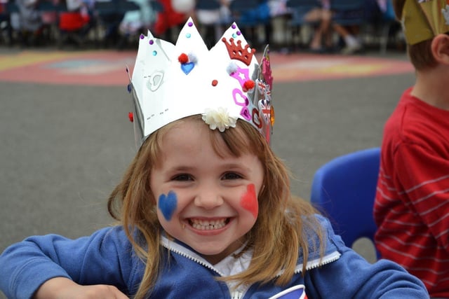 Pupils enjoying a Platinum Jubilee street party in the playground of Devonshire Infant School, Southsea