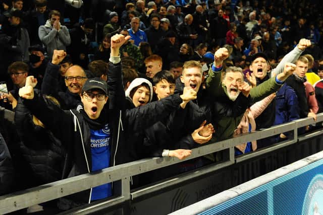 These Pompey fans enjoyed their trip to Wycombe     Picture: Graham Hunt